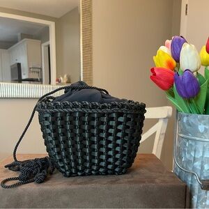 Hard-to-find Bottega Veneta black woven drawstring mini bucket bag